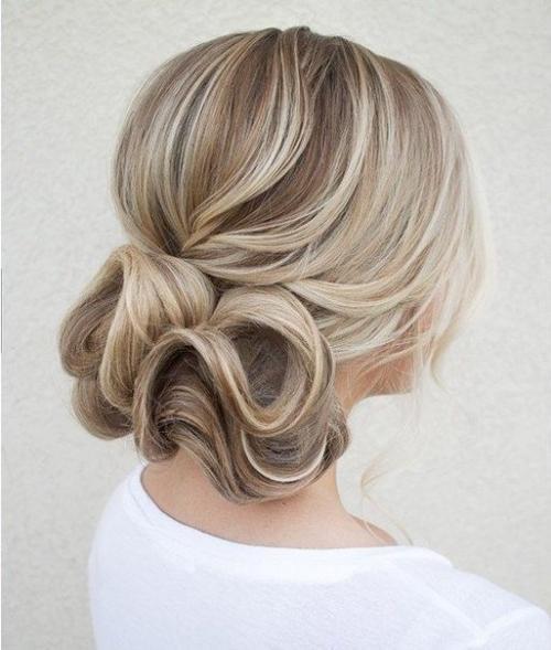 Оригинальные прически с подобранными волосами. 01