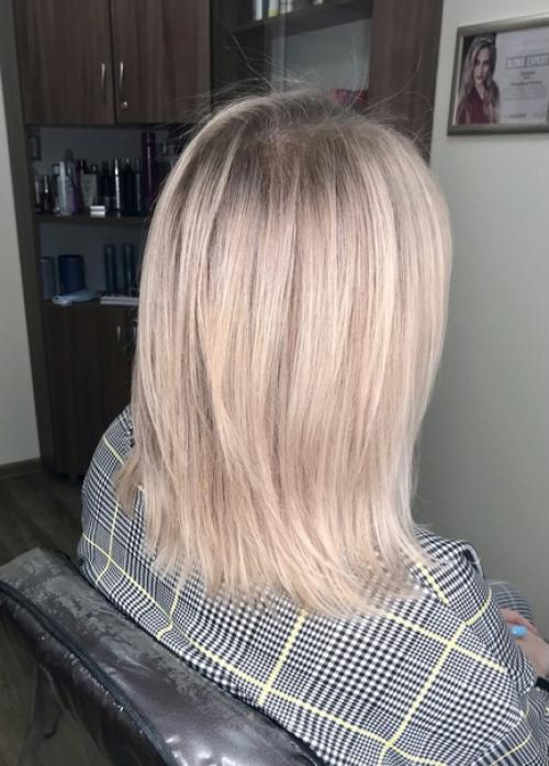 Многослойная стрижка на средние волосы - это модное решение для женщины любого возраста и стиля жизни. 01