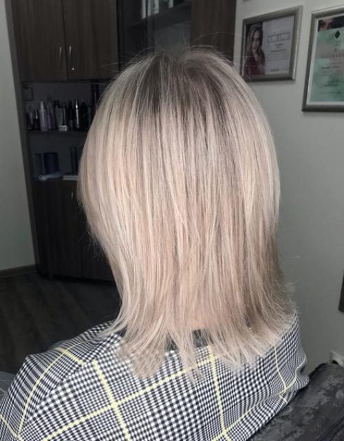 Многослойная стрижка на средние волосы - это модное решение для женщины любого возраста и стиля жизни. 02