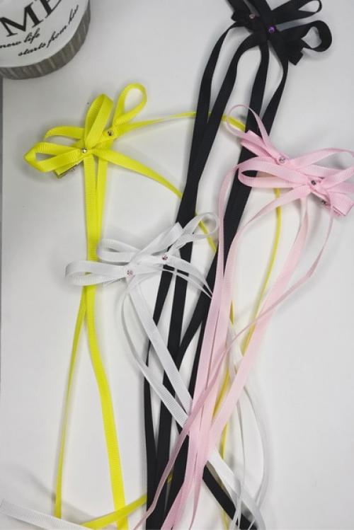 Двойные бантики на заколках - модель, которая активно набирает популярность. 04