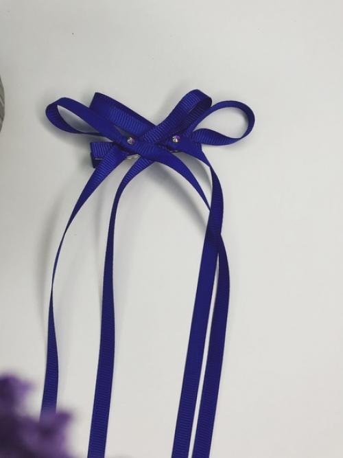 Двойные бантики на заколках - модель, которая активно набирает популярность. 01