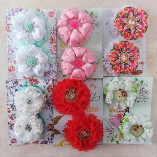 Красивые бантики с полочки номер 51 могут порадовать как маленькую принцессу, так юную леди. 04