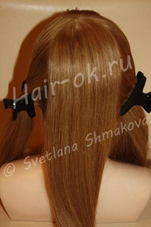 Классический вариант укладки выглядит как большое количество завитков, или же буклей, на затылочной части головы. 01