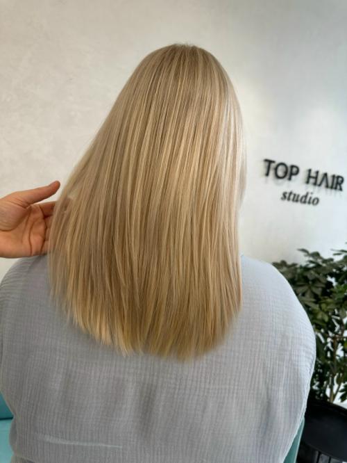 Слоистая стрижка - это техника, когда волосы подстригают на разные уровни (слои. 01