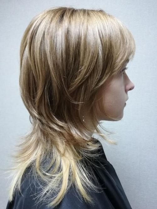 Стрижка Wolf Cut - в ней сочетаются длина и объём Маллет, и многослойность от шэг. 01